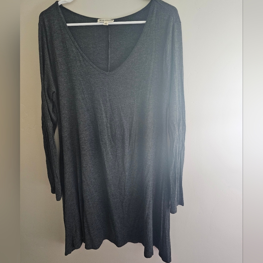 Long sleeve black dress.
